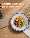 Pasta lunch on a blue MiaoLab thermostatic porcelain plate beside a laptop