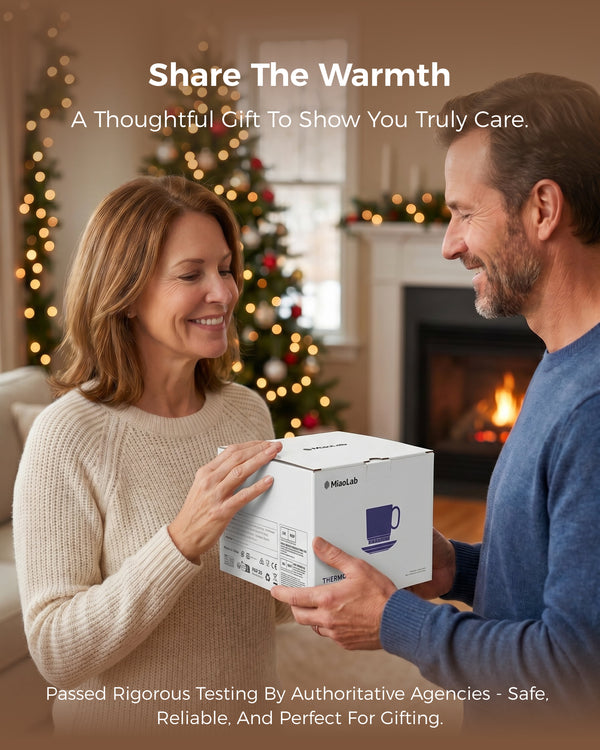 Couple exchanging a boxed MiaoLab thermostatic warming cup as a holiday gift